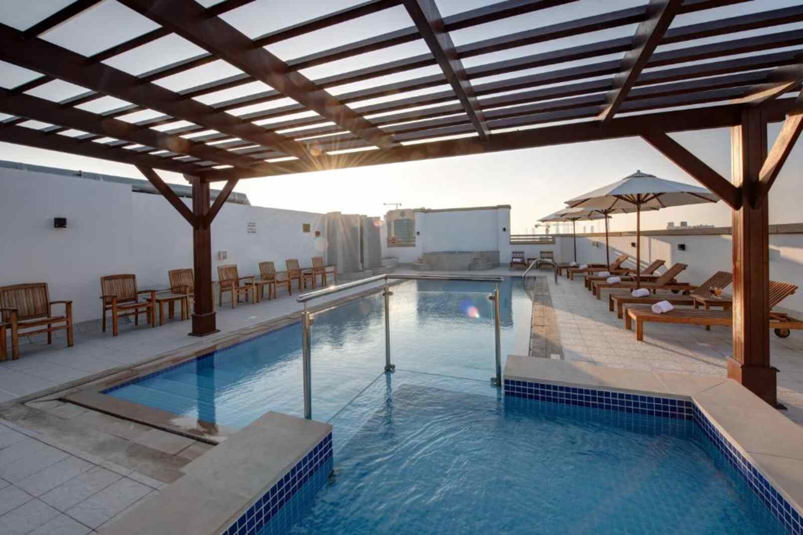 Rooftop pool at Center Hotel Sharjah at sunset