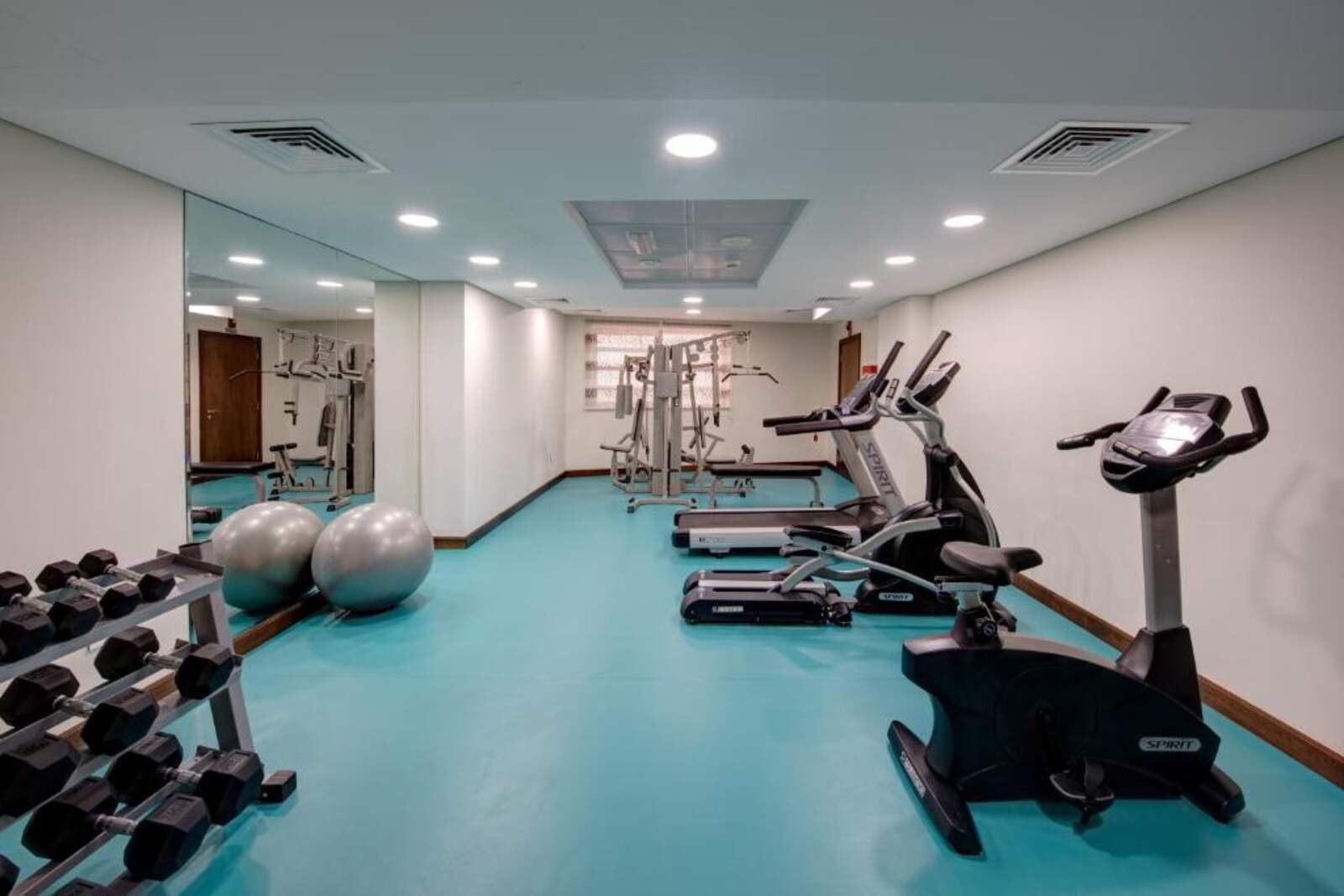 Fitness center with treadmills, bikes and free weights